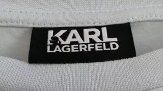 LOTE49°:1Camisa Zara,1 camiseta Karl Lagerfeld.