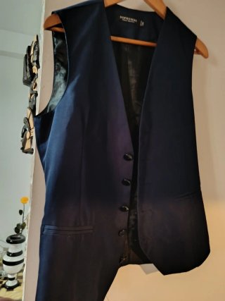Chaleco azul marino pone XXL pero es XL