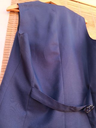 Chaleco azul marino pone XXL pero es XL