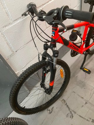 Bicicleta de montaña rockrider Btwin roja