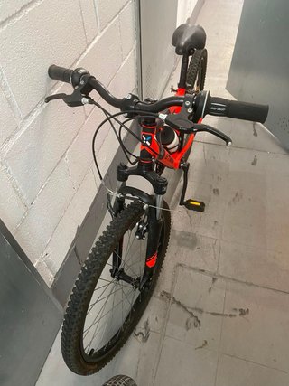Bicicleta de montaña rockrider Btwin roja