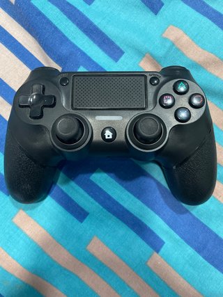 Mando estilo PS4 poco uso seminuevo
