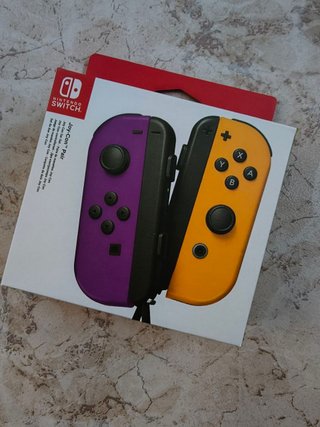 Mandos Nintendo Switch JoyCon Morado y Naranja