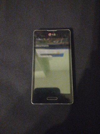 LG Olimpus 5 con cargador