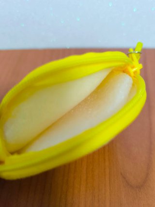 Portamonete giallo Cocomelon con portachiavi