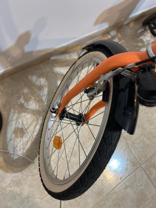 Bicicleta naranja RIVERSIDE sin usar
