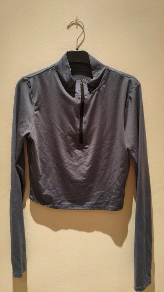 Top deportivo gris manga larga
