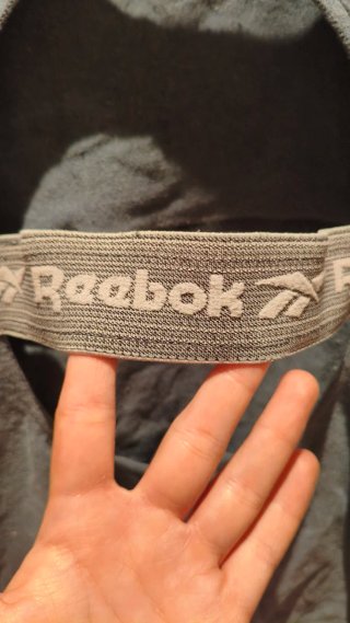 Mono deportivo malla Reebok gris