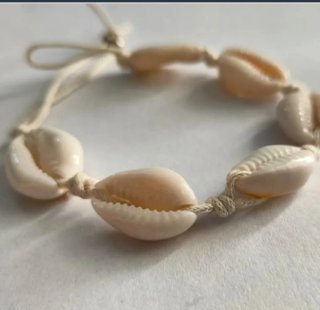 Pulsera de conchas y plata