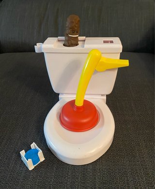 Baño Boom Atrapa la Caca Juego