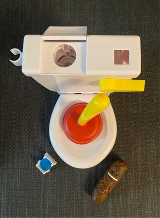 Baño Boom Atrapa la Caca Juego
