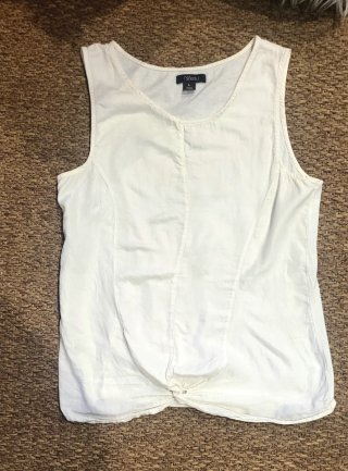 Camiseta Sfera sin mangas con nudo en cintura.