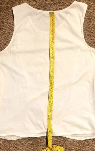 Camiseta Sfera sin mangas con nudo en cintura.