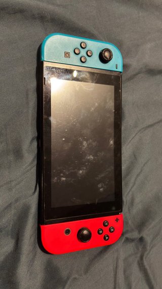 Nintendo Switch + 4 Juegos