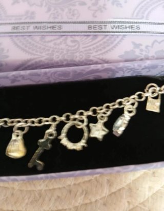 Pulsera baño plata colgantes varios