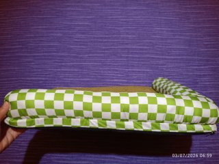 Cama para mascotas con borde acolchado