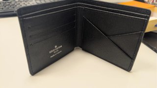 Cartera Louis V. Supreme Negra Naranja Nueva