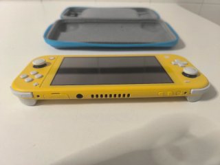 Nintendo Switch Lite + Tarjeta Juegos