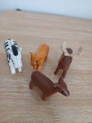 Lote 4 figuras animales (cebra, jabalí, ciervo)