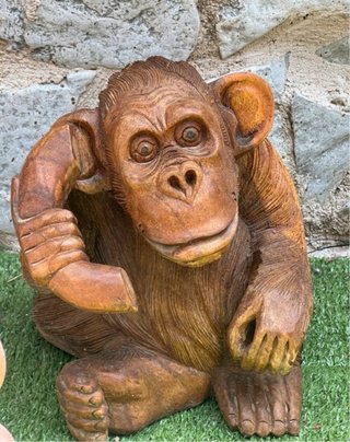 Statue da giardino in legno