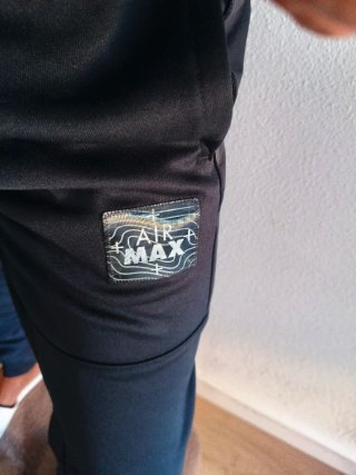 Conjunto chándal Nike negro y gris