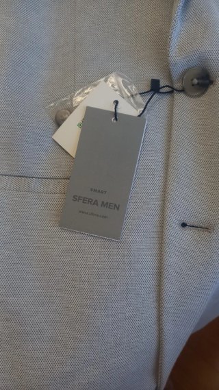 Americana gris nueva con etiqueta
