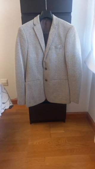 Americana gris nueva con etiqueta