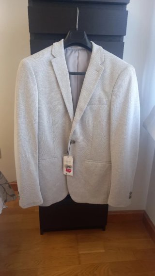 Americana gris nueva con etiqueta