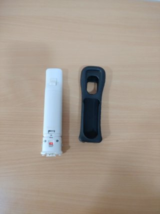 Mando Wii + Funda Negra Motion plus.
