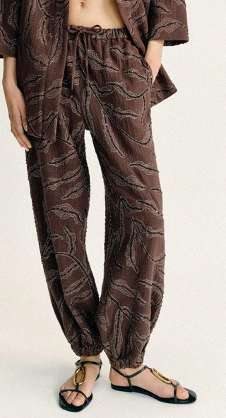 Pantalones bombachos con abalorios
