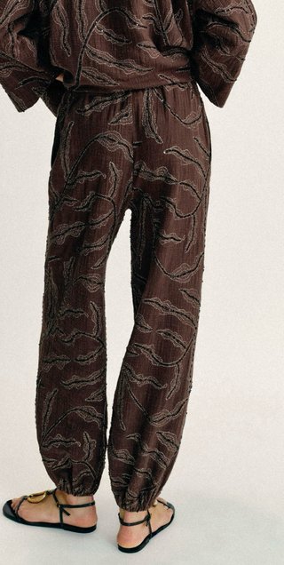 Pantalones bombachos con abalorios