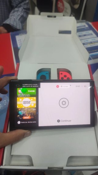 Nintendo Switch OLED + 2 juegos + funda