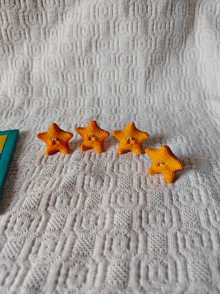 Juego de tres en raya temática mar pulpo estrella