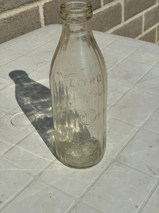 Rara bottiglia da collezione in vetro