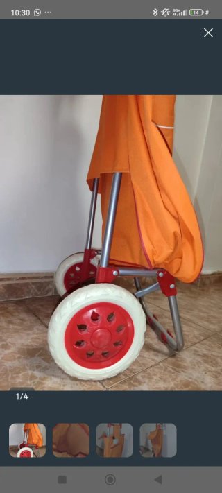 Carrito de la compra naranja y blanco