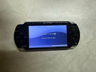 PSP 2004 Negra + Assassin's Creed + Cargador