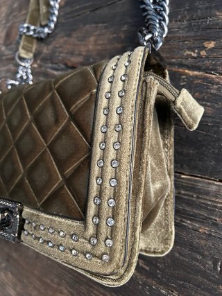 Bolso de terciopelo verde y plateado