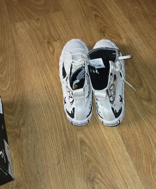 Converse All Star bianche e nere con stampa