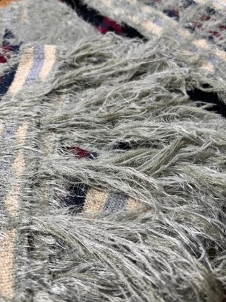 Poncho punto estilo boho con flecos