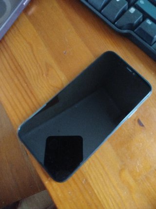 iPhone 11 64GB Morado,para piezas,si enciende
