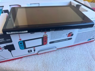 Nintendo Switch Azul y Rojo + Funda de regalo