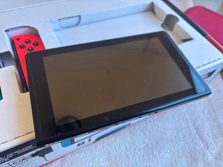 Nintendo Switch Azul y Rojo + Funda de regalo