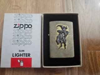 Zippo Slim Bronzo Solido Cowboy Bronco