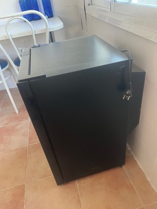 Raccolta a Carratraca: Mobile elegante per vino