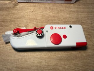 Máquina de coser Singer manual