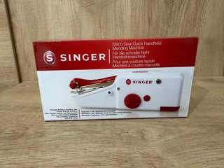 Máquina de coser Singer manual