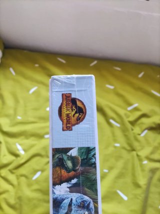 2 Puzzles Harry Potter y Jurassic World 300 piezas
