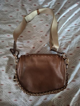 Riñonera Michael Kors tachuelas