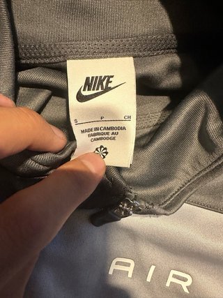 Chaqueta deportiva Nike Air gris y azul