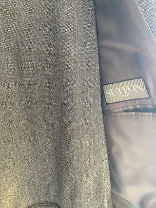 Traje de hombre gris de 1, 70